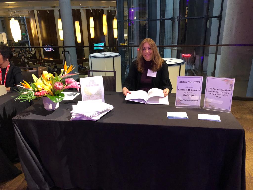 Author Lauren R. Harris at a book signing